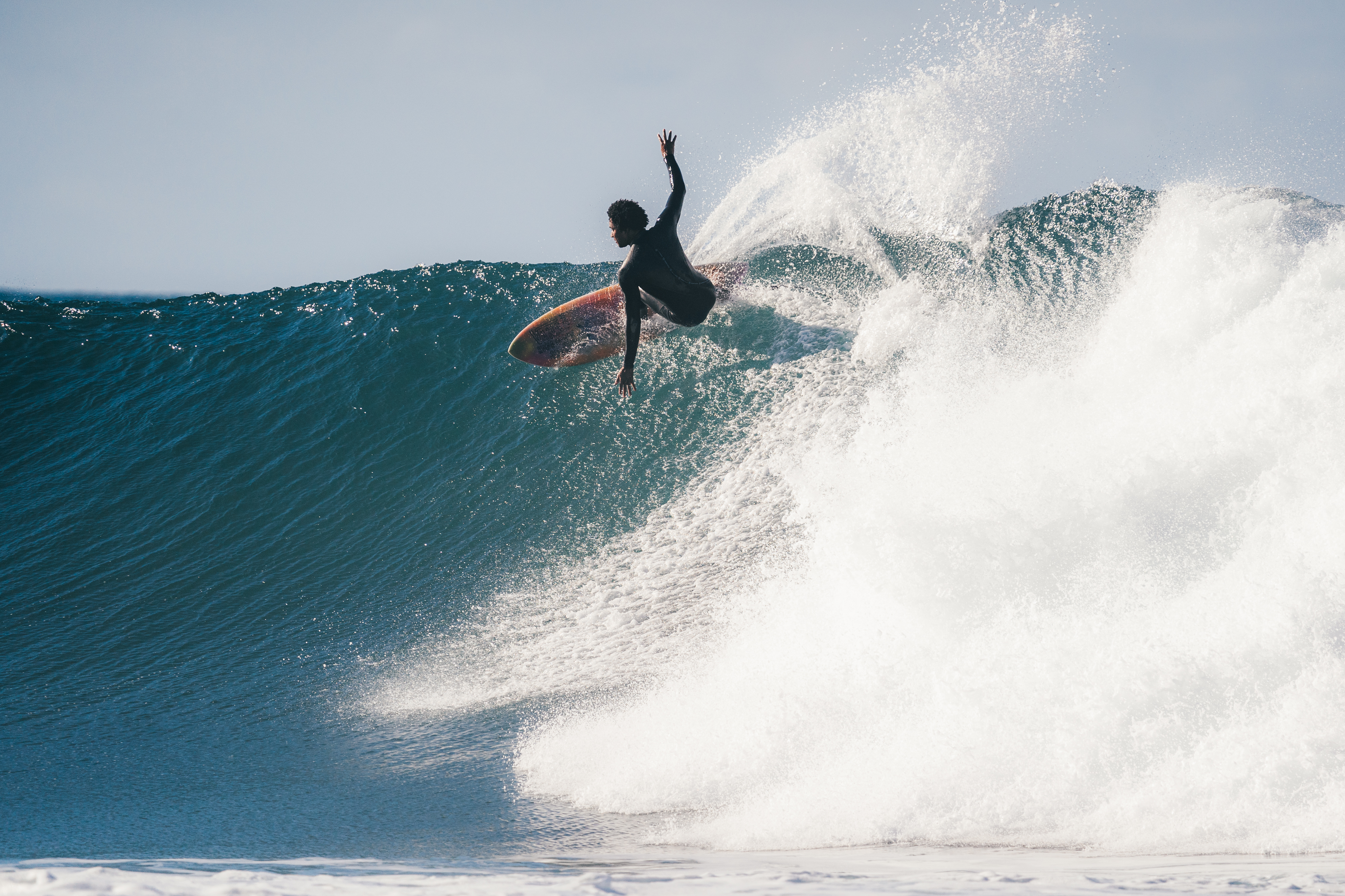 Mikey February performing an aerial on a wave — STAB E.A.S.T. series, Kona Big Wave