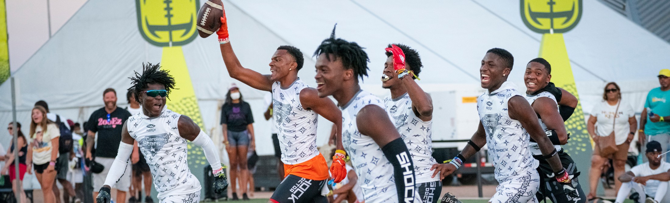 Overtime Shock players celebrating a touchdown catch